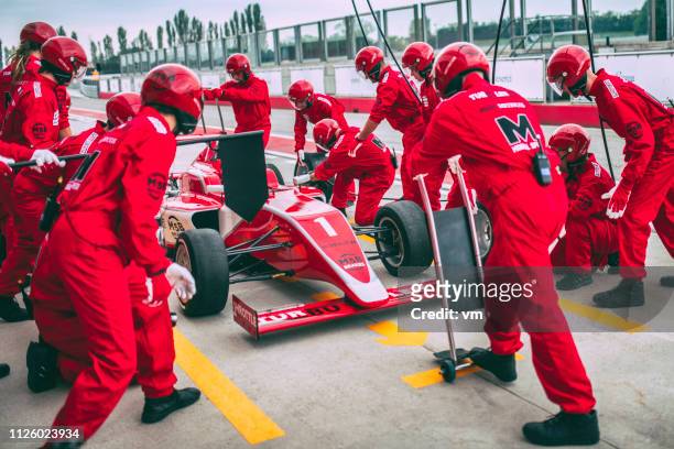 race car pit stop - auto racing stock pictures, royalty-free photos & images