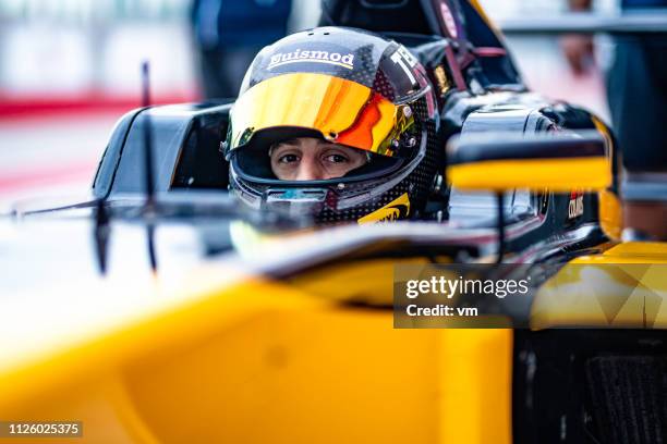 open-wheel race car driver - race car driver stock pictures, royalty-free photos & images