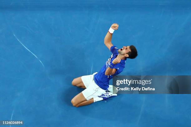 Novak Djokovic of Serbia celebrates championship point in his Men's Singles Final match against Rafael Nadal of Spain during day 14 of the 2019...