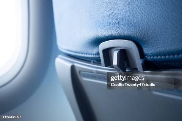 close up passenger food tray in airplane - airplane seat back stock pictures, royalty-free photos & images