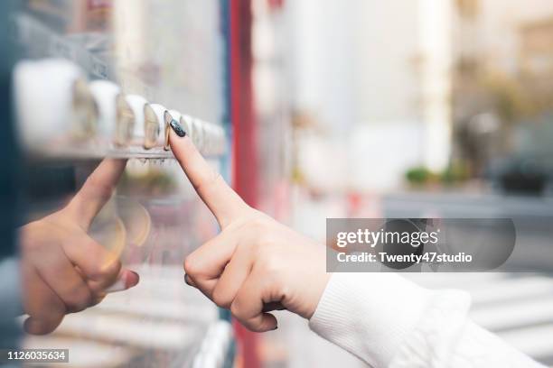 crop image of woman buying a refreshing drink at a vending machine in japan - vending machine 個照片及圖片檔