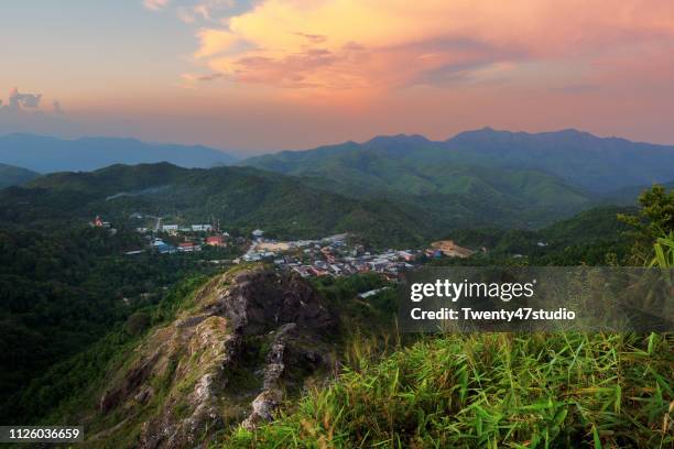 e tong village view from hills war elephants viewpoint in evening at thong pha phum national park of kanchanaburi, thailand - myanmar war stock pictures, royalty-free photos & images