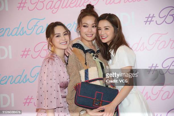 Singer/actress Gillian Chung Yan-tung of the Cantopop duo Twins, singer Joey Yung and singer Charlene Choi of Cantopop group Twins attend Fendi press...