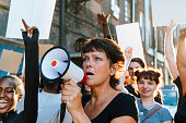 Feminist with a megaphone at a protest