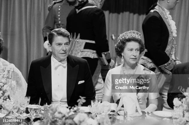 American politician Ronald Reagan , 40th President of the United States, and the Queen of the United Kingdom Elizabeth II at a gala dinner at Windsor...