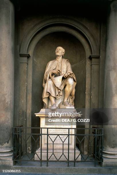 Marble statue of sculptor Filippo Brunelleschi by Luigi Prampolini, Palazzo dei Canonici, Florence , Tuscany, Italy, 19th century.