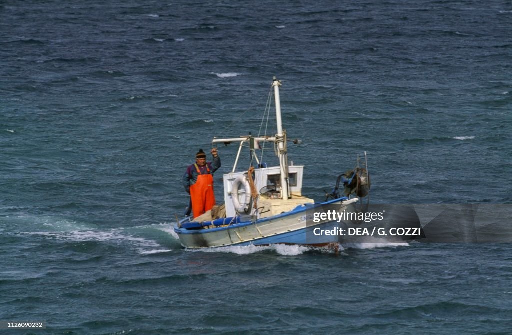 A fishing boat in motion, Cagliari, Sardinia