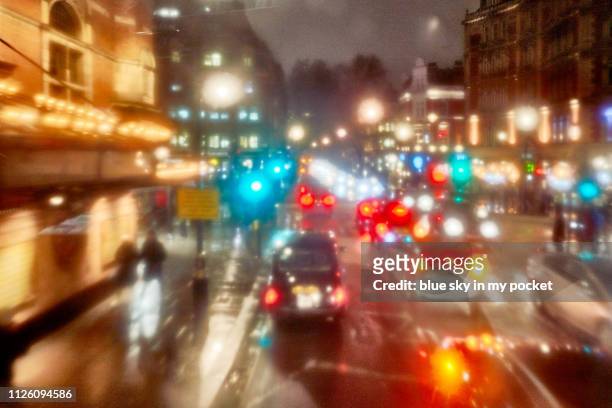 impressionist foggy london and the famouse theatre district of shaftesbury avenue - soho london night stock pictures, royalty-free photos & images