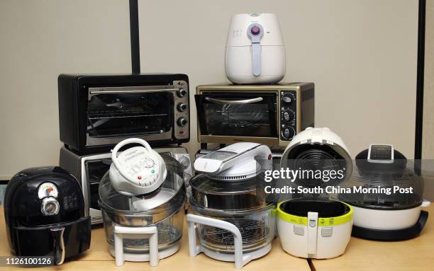 Consumer Council tests the safety of halogen ovens, air flyers and portable electric convection ovens are displayed at a Consumer Council press...