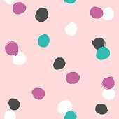 Irregular polka dot drawn by hand with rough brush. Simple seamless pattern. Grunge, sketch, watercolor. Pink, blue, black, purple, white.