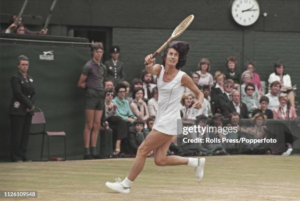 English tennis player Virginia Wade pictured in action against Betty Stove of the Netherlands to win the final of the Women's Singles tournament,...