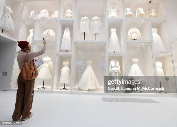 Designer pieces on display during the "Christian Dior: Designer of Dreams" exhibition at Victoria & Albert Museum on January 30, 2019 in London,...