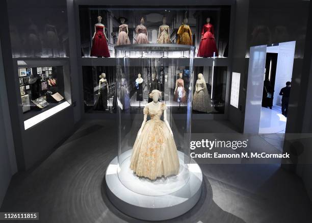 Designer pieces on display during the "Christian Dior: Designer of Dreams" exhibition at Victoria & Albert Museum on January 30, 2019 in London,...