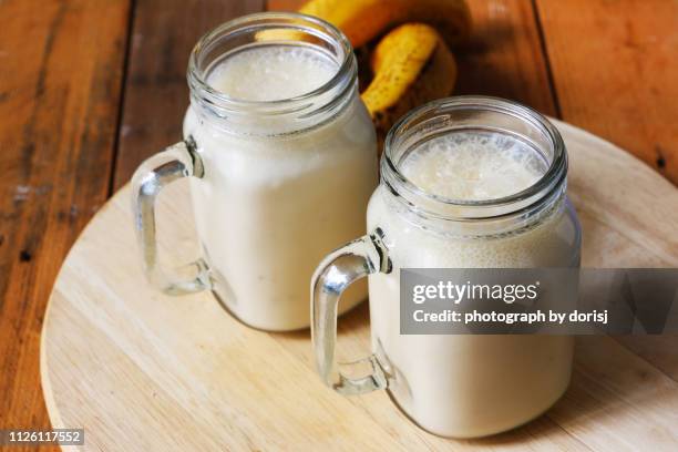 banana lassi drink. india and nepali traditional drink - lassi stock pictures, royalty-free photos & images