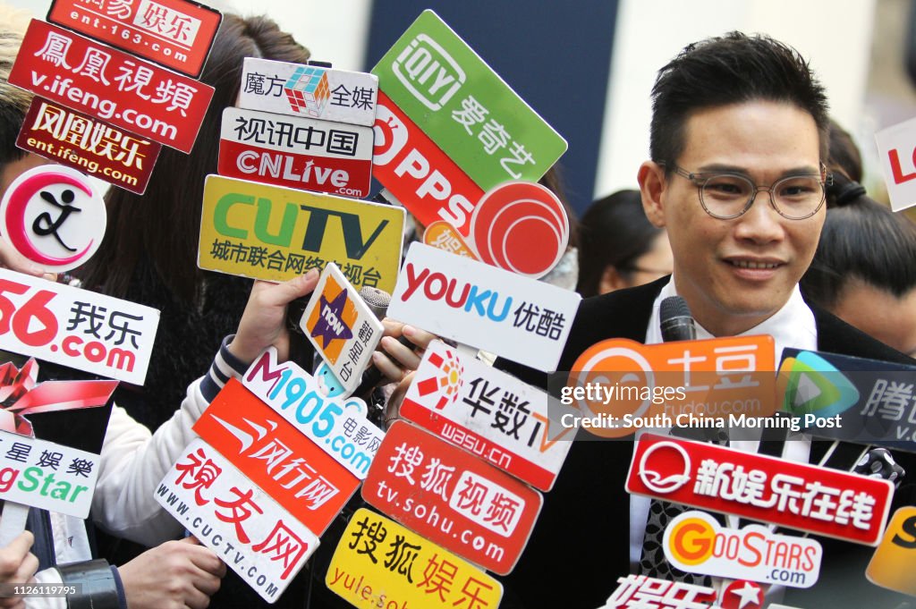 Pop singer William So Wing-hong meets the press on his civil action against an estate agent outside Estate Agents Authority office at Hopewell Centre, Wan Chai. 20FEB14