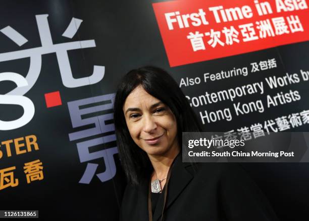 Alessandra Schiavo, Consul General of Italy in Hong Kong and Macau, joins the unpacking of Caravaggio's Supper at Emmaus at the Asia Society Hong...