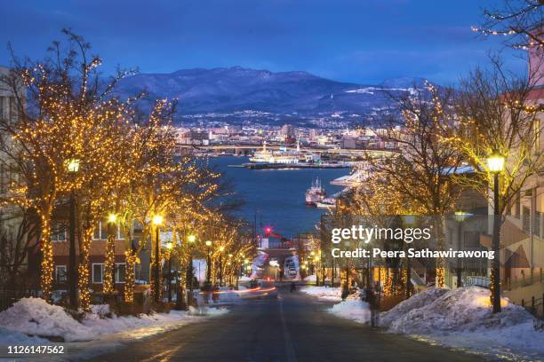 winter hachiman zaka slope in hakodate - hokkaido japan stock-fotos und bilder