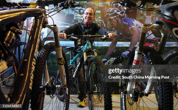 Tony Ho Wing-sang, director of Bull Bike, poses for a photography at the shop in Yau Ma Tei. 04APR14