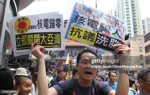 No nuke campaigners march to streets in support of Taiwan counterparts and protest to CLP Customer Service Centre at Tsuen Wan MTR Station. 26APR14