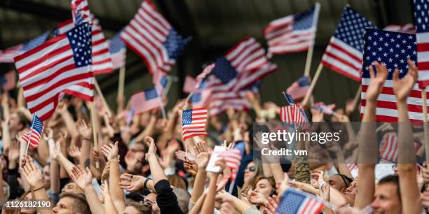 american fans waving their flags - crowd cheering olympics stock pictures, royalty-free photos & images