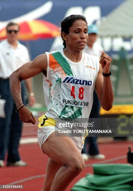 Usha of India speeds during the women's 400 meters at the 12th Asian Athletic Championships in Fukuoka, western Japan 20 July. Usha clocked 52.55...