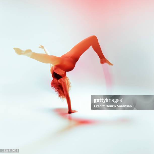 female dancer in motion - one woman handstand bare feet stock pictures, royalty-free photos & images