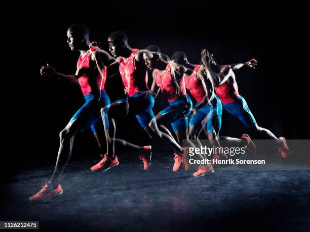 male athlete running - first exposure series stock pictures, royalty-free photos & images