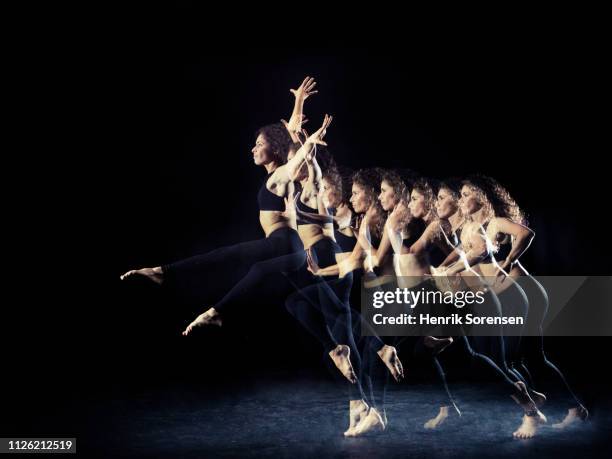 female dancer in multiple motion - long exposure dancer stock-fotos und bilder