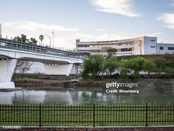 The Rio Grande river flows underneath the Gateway to the Americas International Bridge near the U.S. And Mexico border in Laredo, Texas, U.S, on...