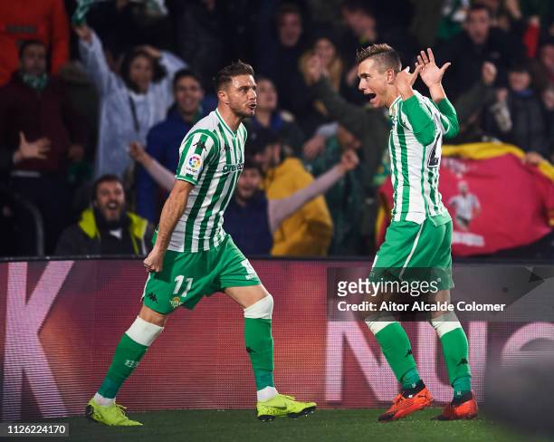 Giovani Lo Celso of Real Betis celebrates with his teammate Joaquin Sanchez of Real Betis after scoring the opening goal during the Copa del Quarter...