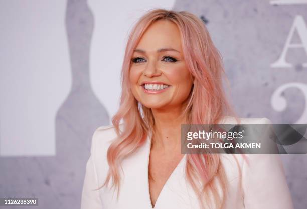 British singer Emma Bunton, member of The Spice Girls, poses on the red carpet on arrival for the BRIT Awards 2019 in London on February 20, 2019. /...