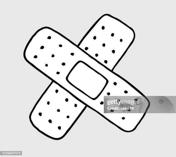 adhesive bandage cross shape - adhesive bandage stock illustrations