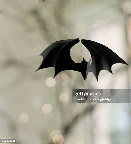 hanging bat decoration - bat animal stock pictures, royalty-free photos & images