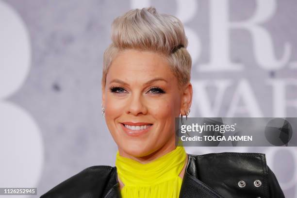 Singer-songwriter Pink poses on the red carpet on arrival for the BRIT Awards 2019 in London on February 20, 2019. / RESTRICTED TO EDITORIAL USE NO...