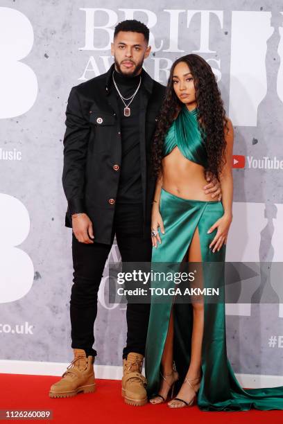 British girl group 'Little Mix' member, Leigh-Anne Pinnock and footballer Andre Gray pose on the red carpet on arrival for the BRIT Awards 2019 in...