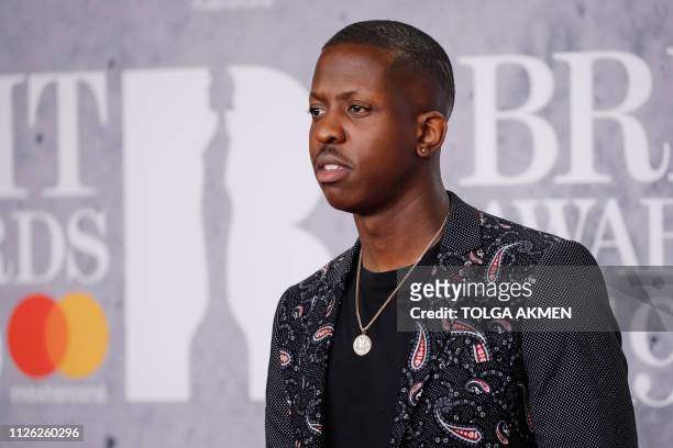 British film director Jamal Edwards poses on the red carpet on arrival for the BRIT Awards 2019 in London on February 20, 2019. / RESTRICTED TO...