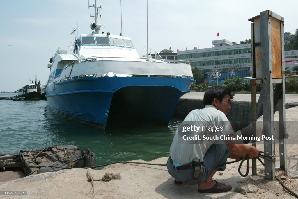 A ferry for the Zhuhai and Guishan Island service at the pier. 20 May 2003