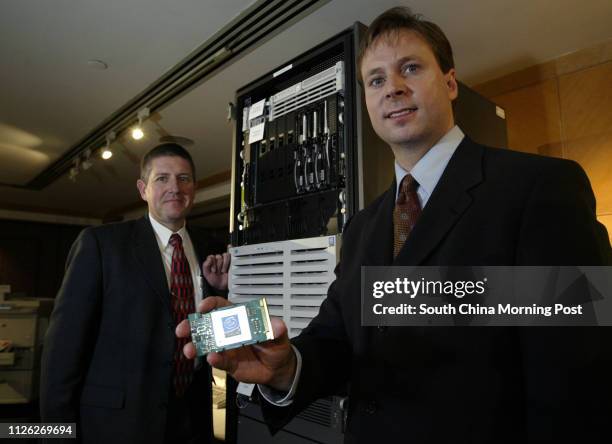 Peter Hall, Director, Business Critical System of HP Asia Pacific and Kirk Skaugen, Director, Asia Pacific Solution Group of Intel, pictured with the...
