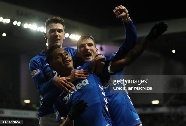 Alfredo Morelos of Rangers celebrates with Borna Barisic and Ryan Jack after scores the opening goal during the Scottish Cup 5th Round Replay between...