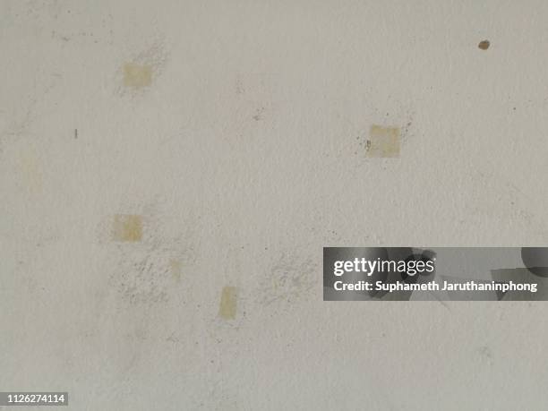 glue and scotch tape stain on white wall. - scotch tape stock pictures, royalty-free photos & images