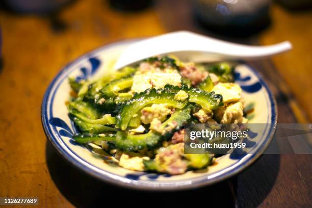 goya champuru (okinawa traditional dish) - naha okinawa stock pictures, royalty-free photos & images