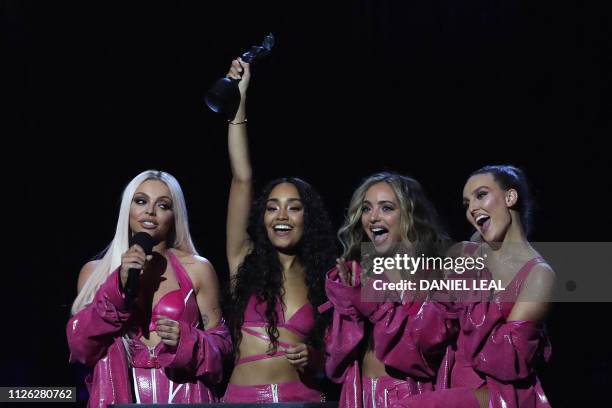 British girl group 'Little Mix', Perrie Edwards, Jesy Nelson, Jade Thirlwall and Leigh-Anne Pinnock collect their British Artist Video of the Year...