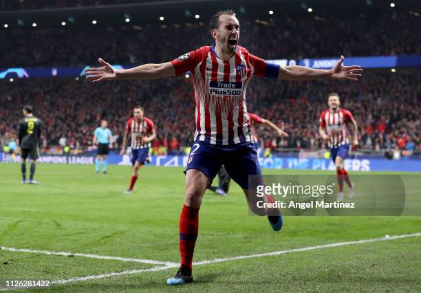 Diego Godin of Atletico Madrid celebrates after scoring his team's second goal during the UEFA Champions League Round of 16 First Leg match between...