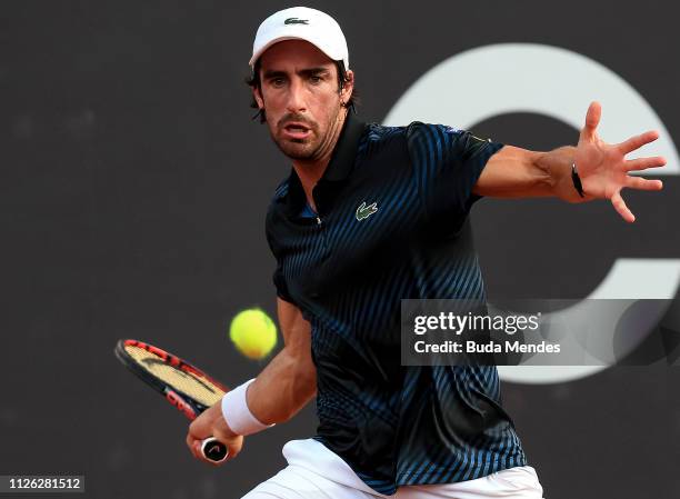 Pablo Cuevas of Uruguay returns a shot to Diego Schwartzman of Argentina during the ATP Rio Open 2019 at Jockey Club Brasileiro on February 20, 2019...