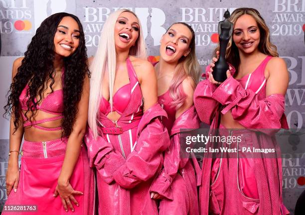 Leigh-Anne Pinnock, Jesy Nelson, Perrie Edwards and Jade Thirlwall of Little Mix with their Best British Video Brit Award in the press room at the...