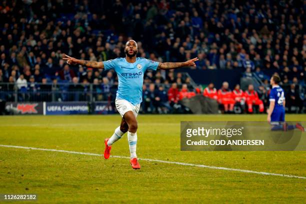 Manchester City's English forward Raheem Sterling celebrates after scoring the winning 2-3 goal during the UEFA Champions League round of 16 first...