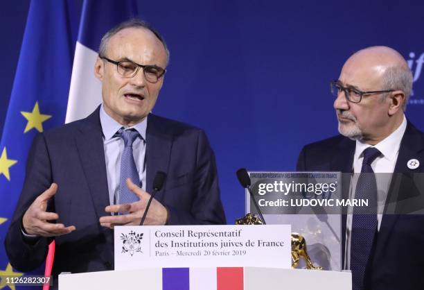 French journalist Philippe Val speaks after he was awarded with the Crif prize by the Crif president Francis Kalifat during the 34th annual dinner of...