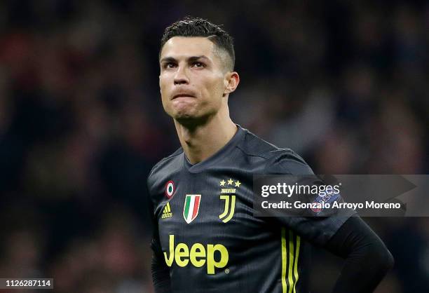 Cristiano Ronaldo of Juventus looks dejected during the UEFA Champions League Round of 16 First Leg match between Club Atletico de Madrid and...