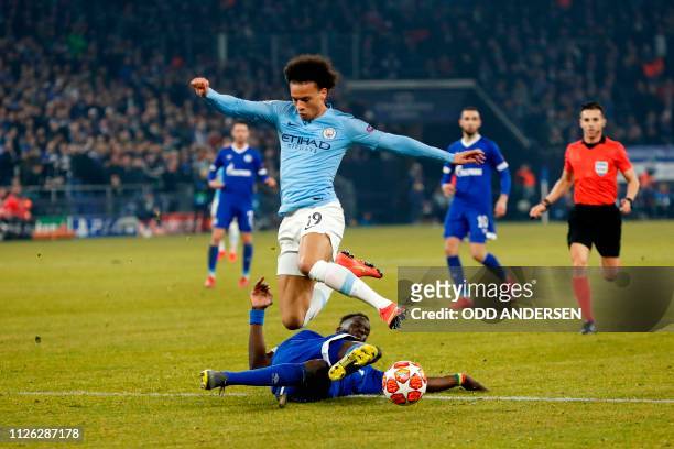 Manchester City's German midfielder Leroy Sane vies with Schalke's Senegalese defender Salif Sane during the UEFA Champions League round of 16 first...