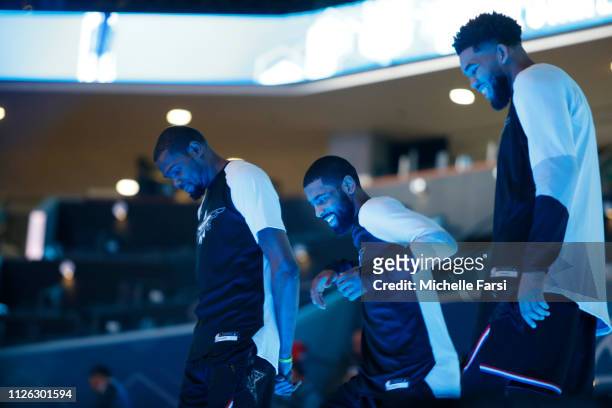 Kevin Durant Kyrie Irving and Karl Anthony-Towns of Team LeBron look on during the 2019 NBA All-Star Game on February 17, 2019 at the Spectrum Center...
